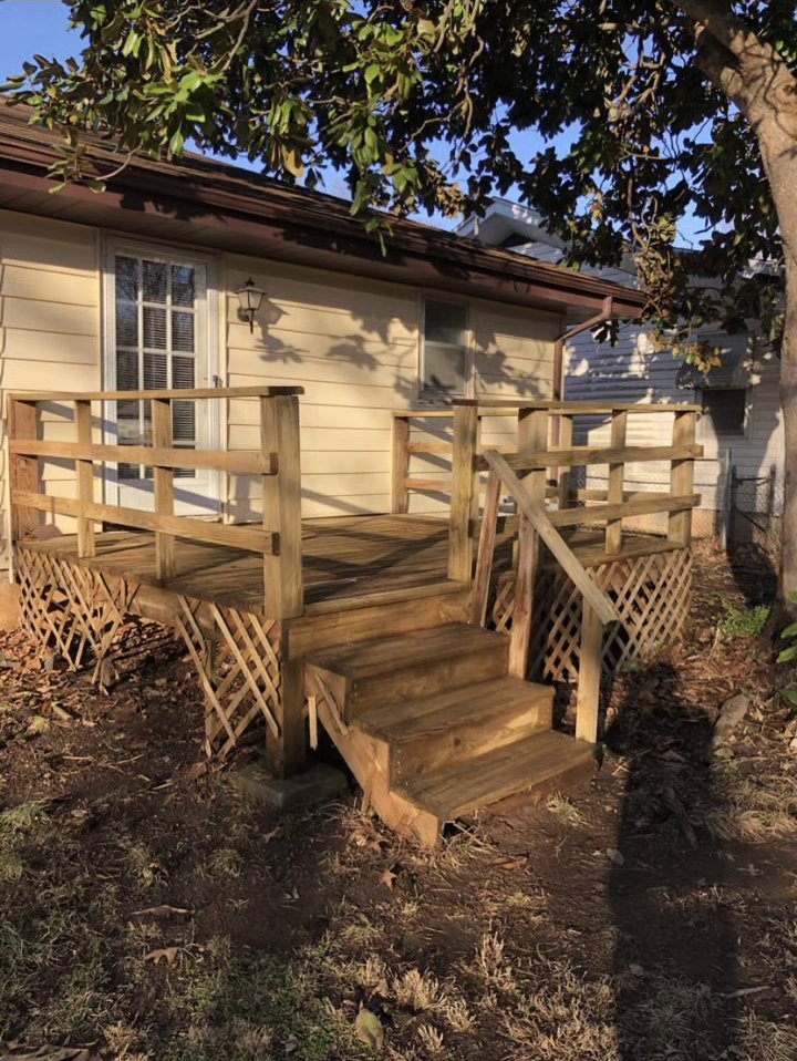 Clean, restored wood deck and stairs after pressure washing
